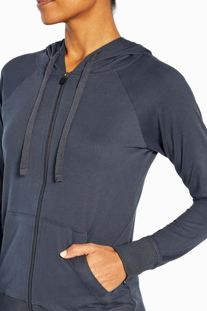 Mona Jacket, alternate angle view, showing visible design features and texture of the smooth woven fabric.. 