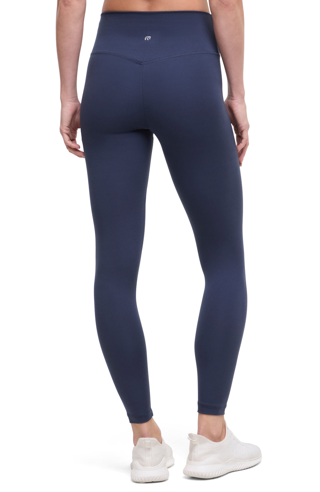 Back view of woman wearing navy leggings with a white background. #color_mood-indigo