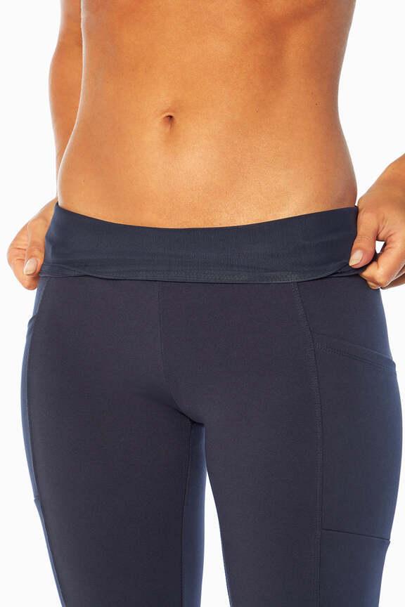 Eclipse Side Pocket Tummy Control Yoga Pant, alternate angle view, showing visible design features and texture of the durable stretch fabric.. #color_midnight-blue