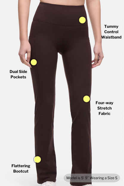Dark brown leggings with features highlighted on a white background. 