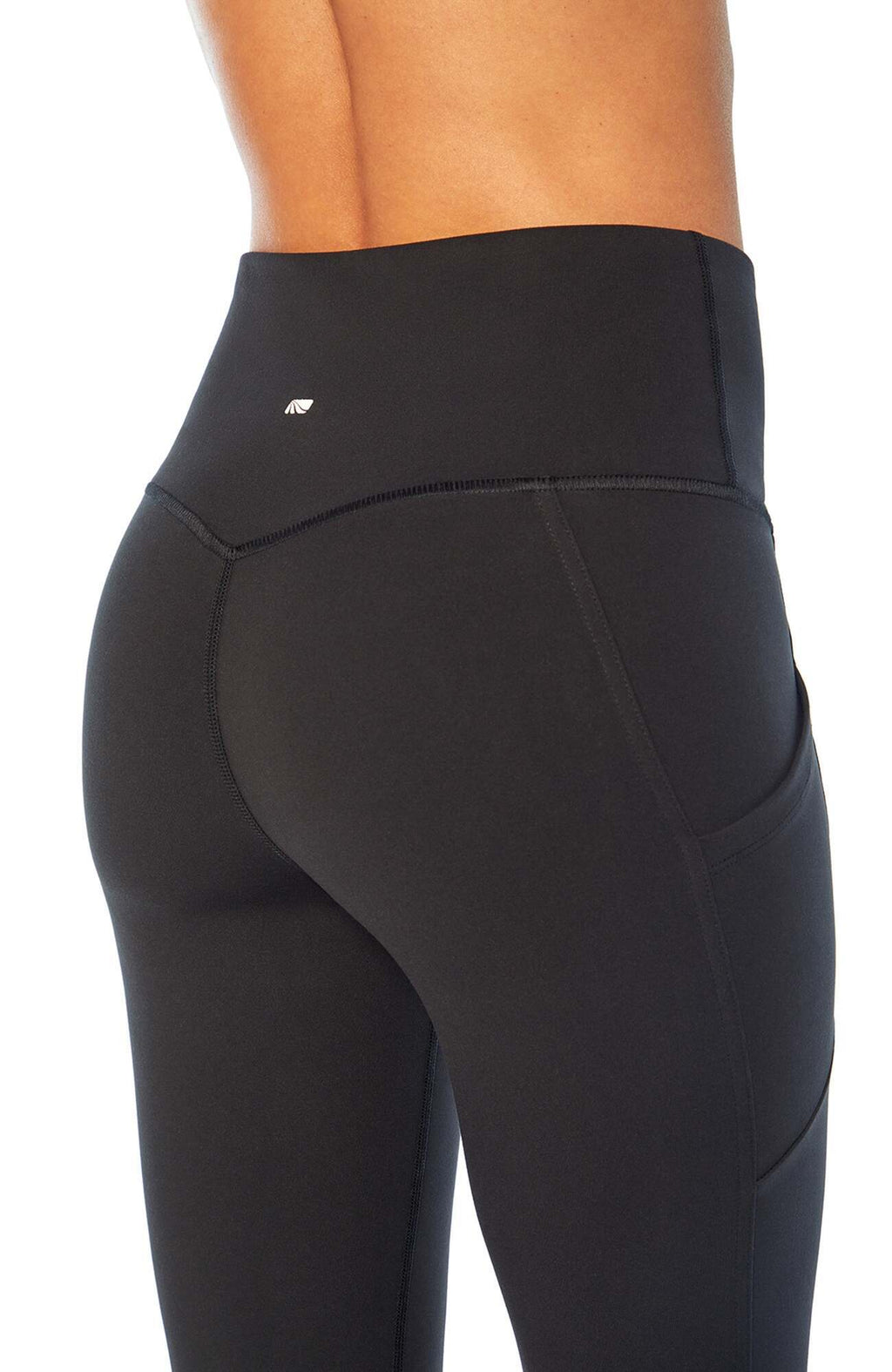Olivia Side Pocket Tummy Control Bermuda Shorts, side view showing pocket placement, showing visible design features and texture of the soft knit.. #color_black