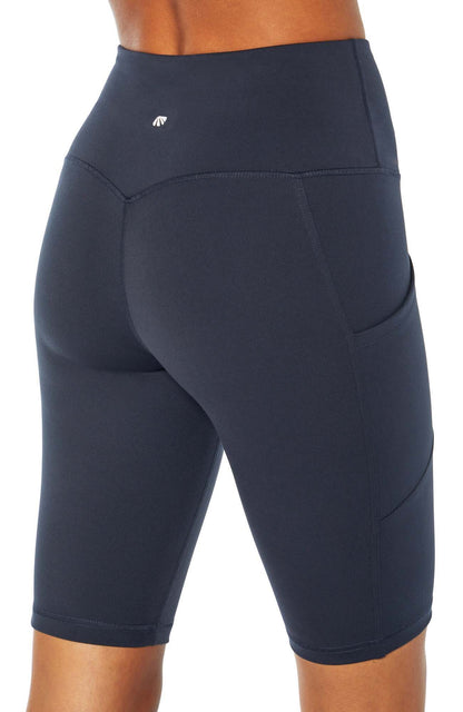 Olivia Side Pocket Tummy Control Bermuda Shorts, alternate angle view, showing visible design features and texture of the soft knit fabric.. 