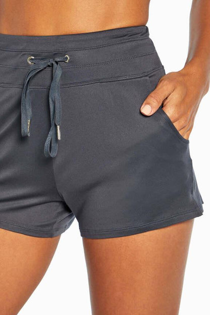 Sofia Side Pocket Short, alternate angle view, showing visible design features and texture of the soft knit fabric.. 