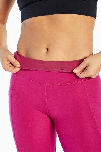 Brenda Side Pocket Tummy Control Bermuda, alternate angle view, showing visible design features and texture of the soft knit fabric.. 