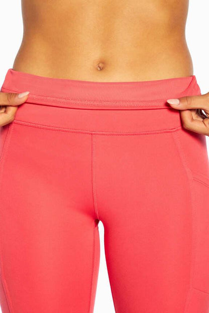 Brenda Side Pocket Tummy Control Bermuda, alternate angle view, showing visible design features and texture of the soft knit fabric.. 