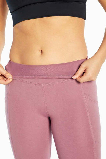 Brenda Side Pocket Tummy Control Bermuda, alternate angle view, showing visible design features and texture of the soft knit fabric.. 