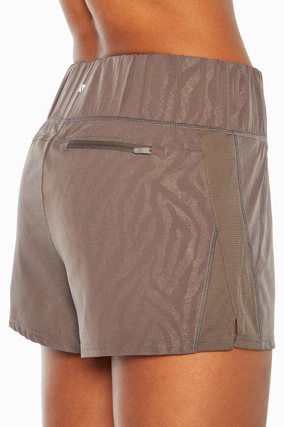 Express Short, alternate angle view, showing visible design features and texture of the soft knit fabric..