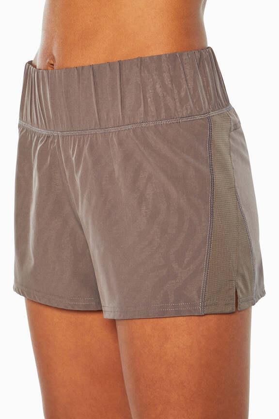 Express Short, alternate angle view, showing visible design features and texture of the soft knit fabric.. 