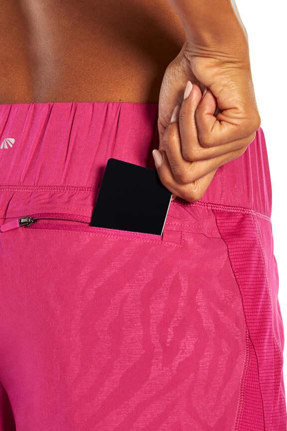 Express Short, alternate angle view, showing visible design features and texture of the soft knit fabric.. 