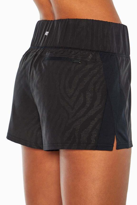 Express Short, alternate angle view, showing visible design features and texture of the soft knit fabric.. 