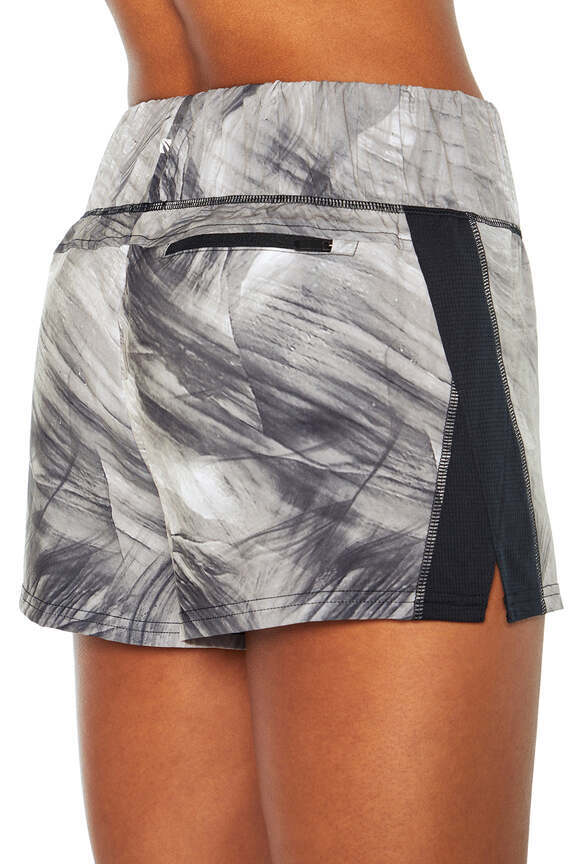 Express Short, back view, showing visible design features and texture of the soft knit fabric.. #color_black-dusk-texture