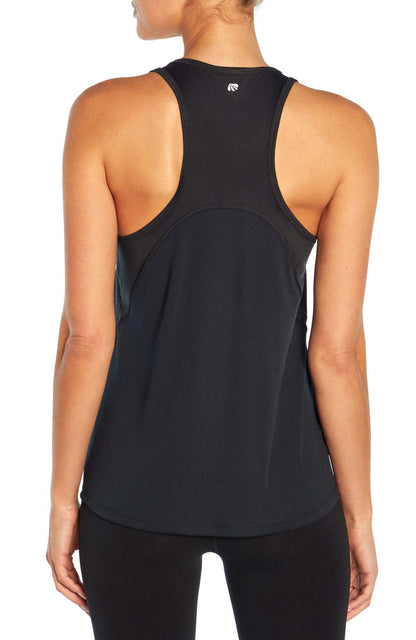 Renata Tank, side view showing pocket placement, showing visible design features and texture of the soft knit fabric.. 
