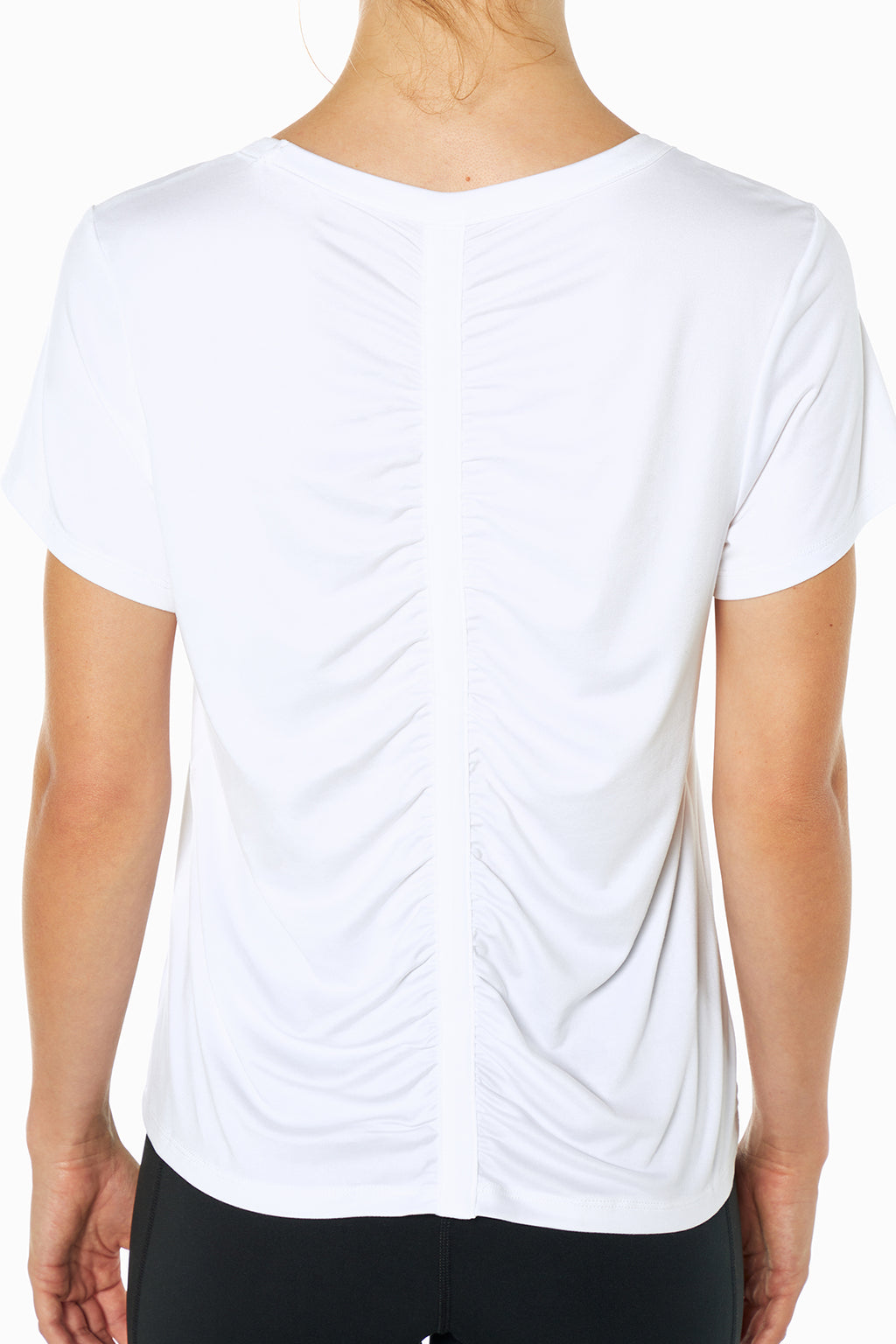 Gather Tee, side view showing pocket placement, showing visible design features and texture of the soft knit fabric.. #color_white