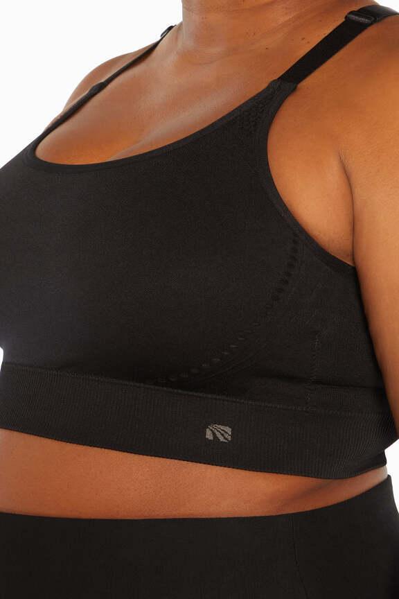 Alyssa Seamless Sports Bra (Plus Size), close-up view of fabric and stitching, showing visible design features and texture of the soft knit fabric.. 