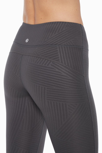 Active Basic Capri, close-up view of fabric and stitching, showing visible design features and texture of the soft knit fabric.. 