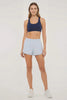 Flora Woven Short, alternate angle view, showing visible design features and texture of the soft knit fabric. #color_blue-finch