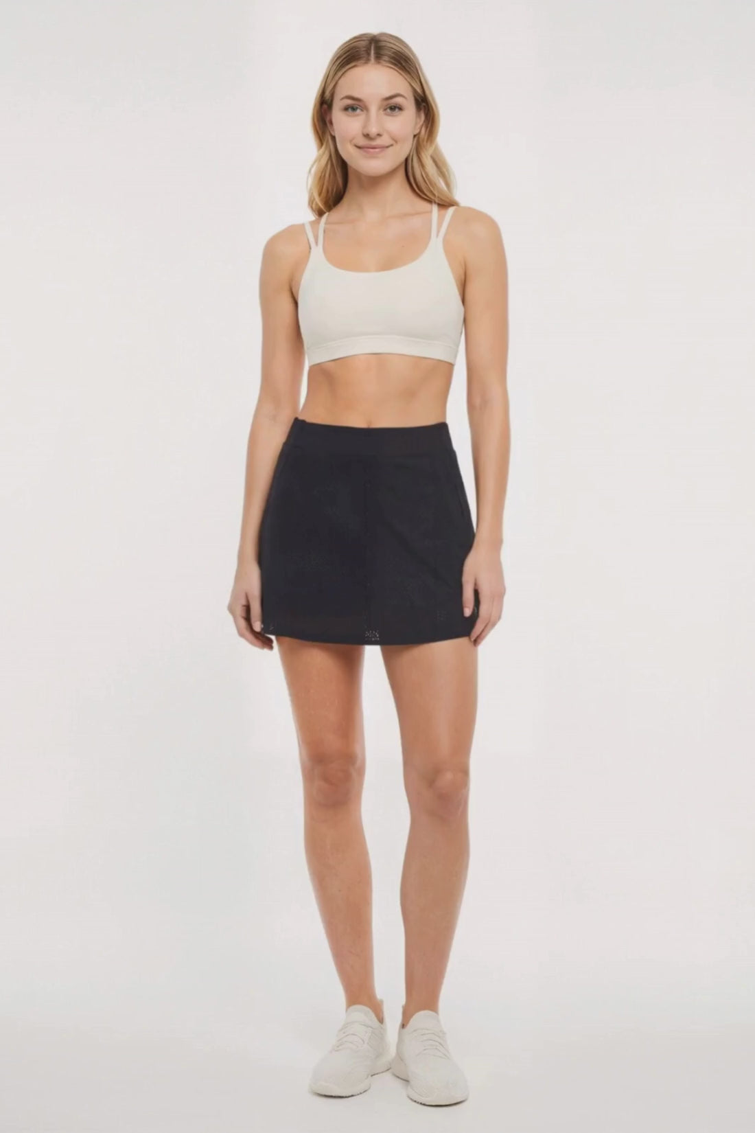 Hazel Woven Skort, alternate angle view, showing visible design features and texture of the soft knit fabric. #color_black
