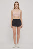 Flora Woven Short, alternate angle view, showing visible design features and texture of the soft knit fabric. #color_black
