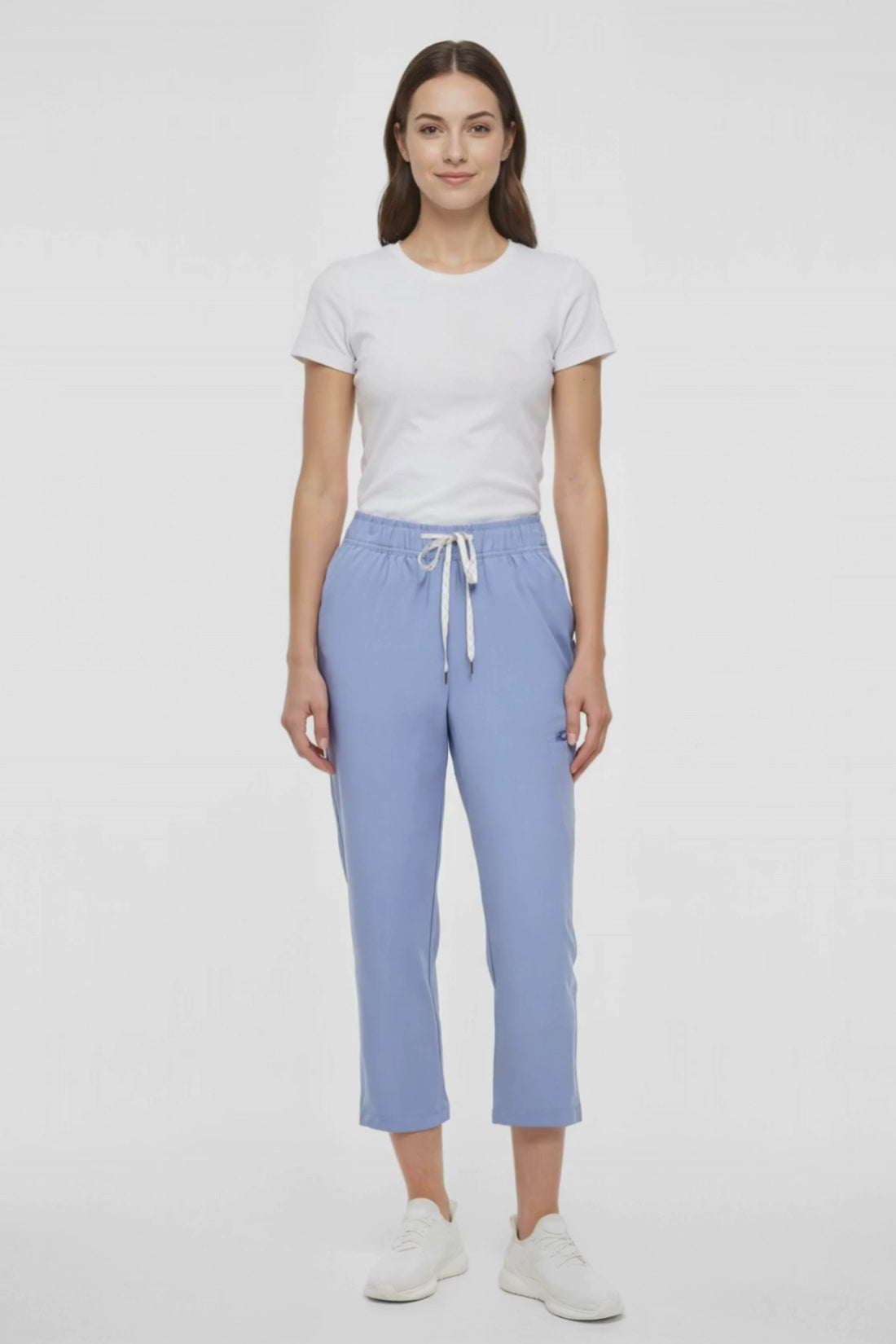 Video view of light blue pants worn by a woman with white drawstring waist on a white background. #color_troposphere