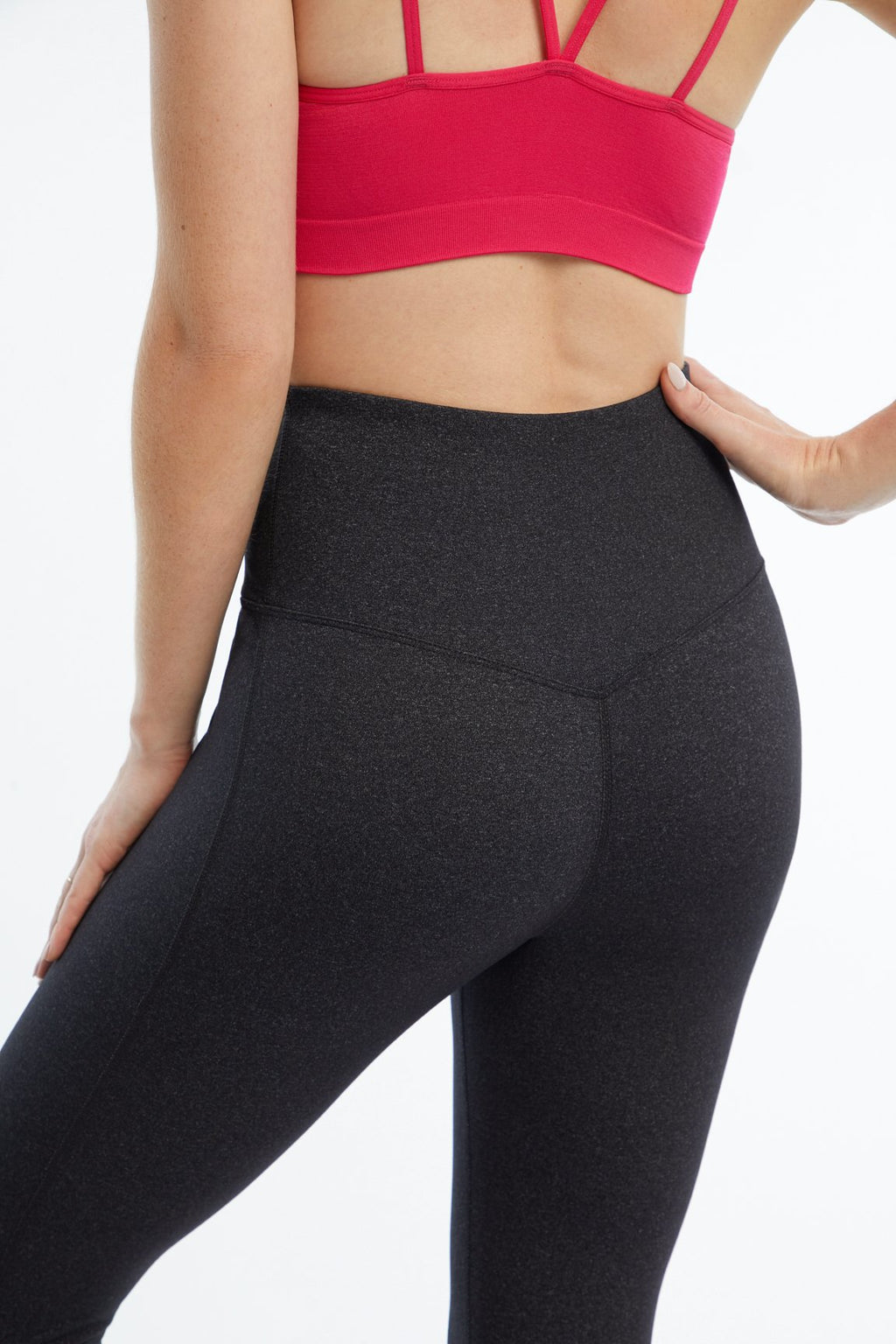 Brooke High Rise Tummy Control Mid Calf Capri, close-up view of fabric and stitching, showing visible design features and texture of the soft knit.. #color_heather-black