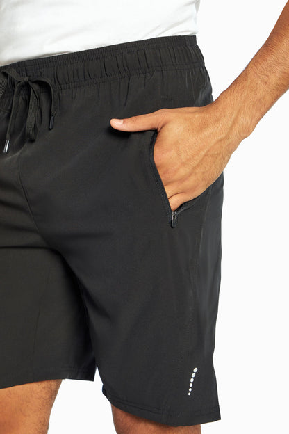 Balance Collection For Men Energy Black Short, front pocket view, showing visible design features and texture of the soft knit fabric. 