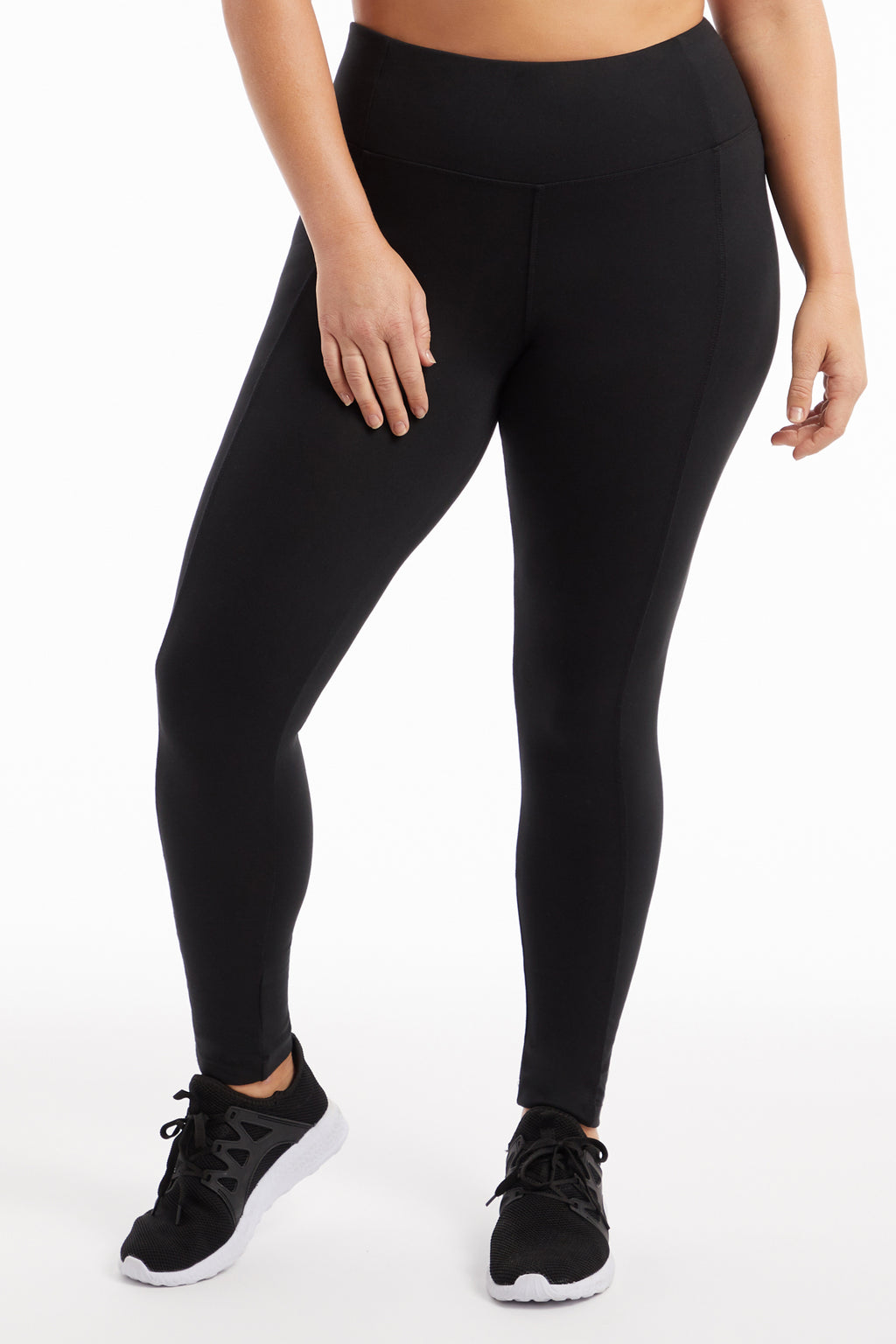 High-Rise Tummy Control Leggings (Plus Size), front view, showing visible design features and texture of the stretch knit fabric.. #color_black