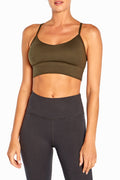 Alli Sports Bra, front view, showing visible design features and texture of the soft knit fabric.. #color_rosin-green