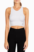 Evie Seamless Sports Bra, front view, showing visible design features and texture of the soft knit fabric.. #color_white