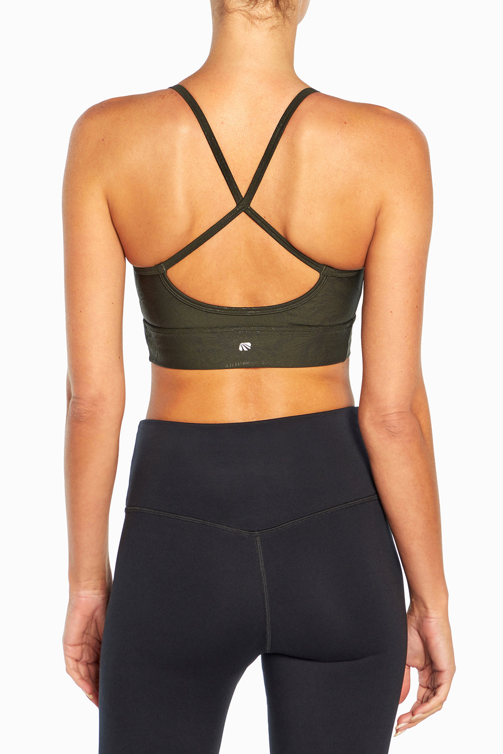 Irene Sports Bra, close-up view of fabric and stitching, showing visible design features and texture of the soft knit fabric.. #color_rosin-peonies-clear-foil