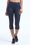 Brooke High Rise Tummy Control Capri, front view, showing visible design features and texture of the soft knit fabric.. #color_heathered-black