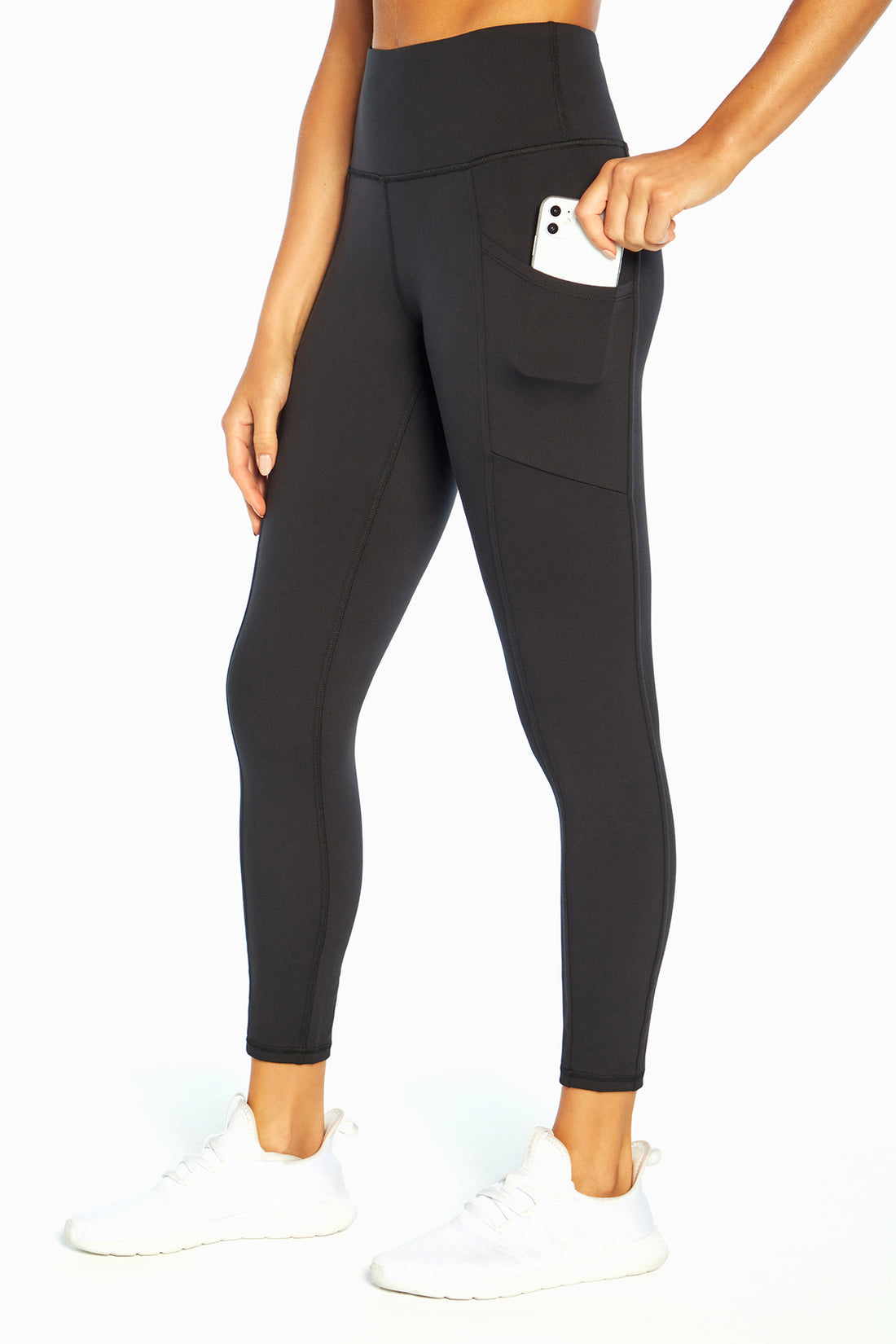 Eclipse Side Pocket Tummy Control Ankle Legging, front view, showing visible design features and texture of the stretch knit fabric..
