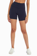 Linnette Side Pocket Tummy Control Short, front view, showing visible design features and texture of the soft knit fabric.. #color_midnight-blue
