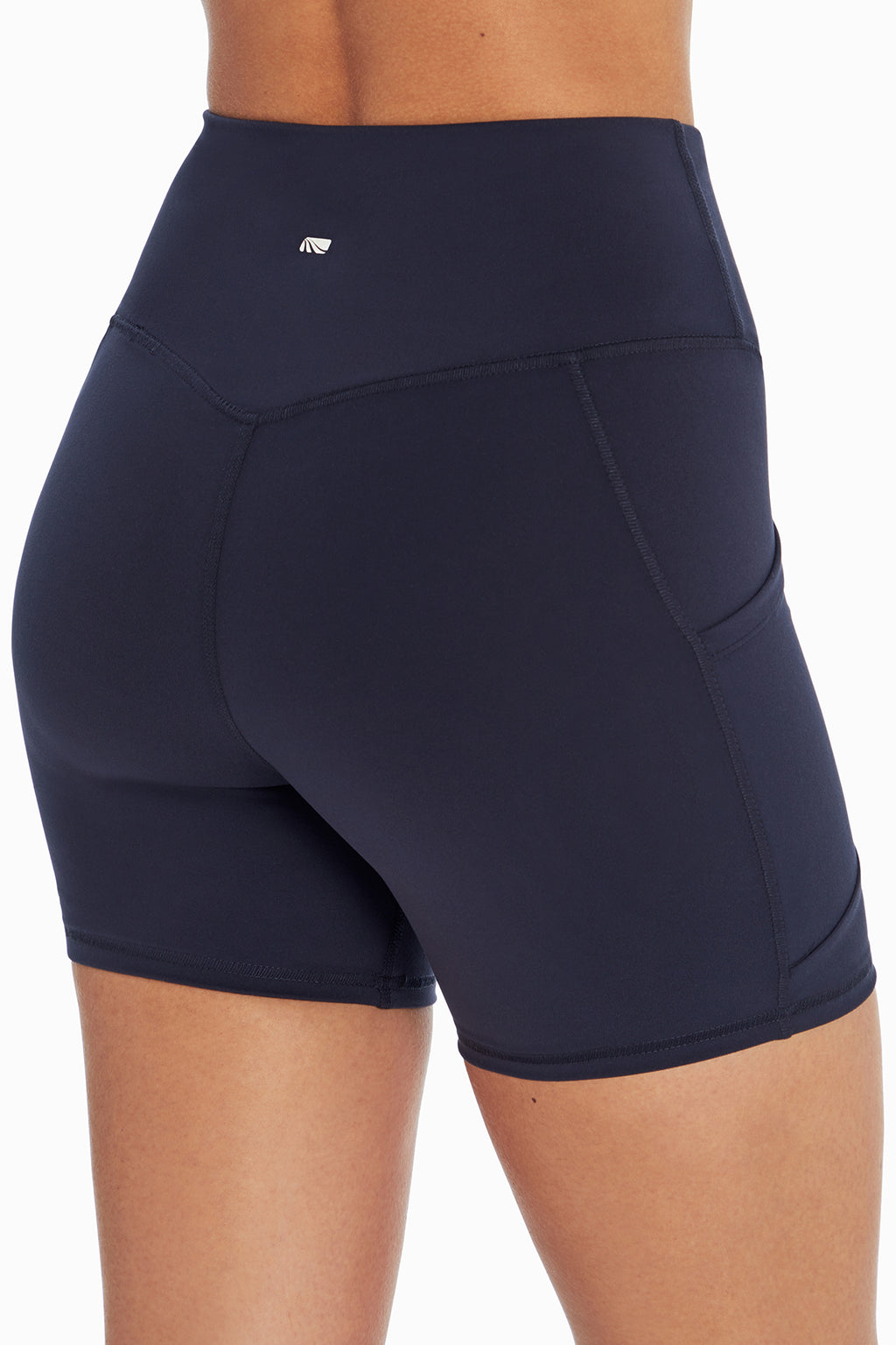 Linnette Side Pocket Tummy Control Short, back view, showing visible design features and texture of the soft knit fabric.. #color_midnight-blue